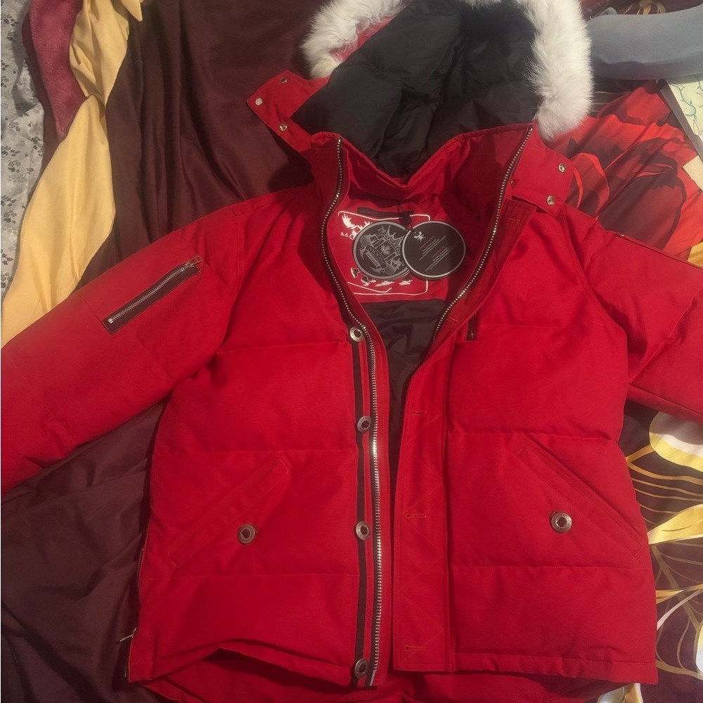 Red moose knuckle parka